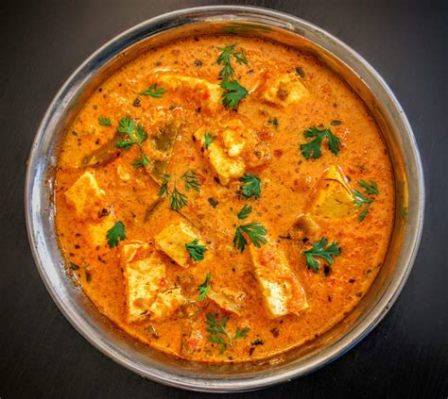  Kadai Paneer: Een romige Indiase kaascurry vol met complexe kruiden en de warmte van verse chilipepers!